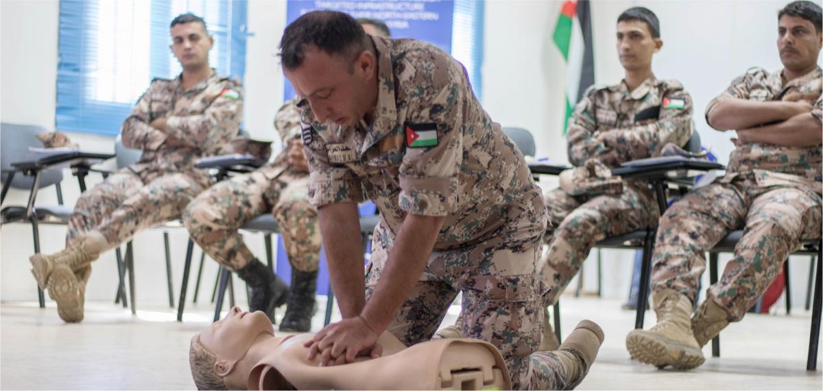 Jordanian military performing CPR on mannequin